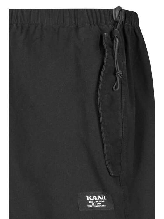 Karl Kani Karl Kani Spodnie garniturowe WOVEN RETRO WASHED PARACHUTE Czarny To Fit