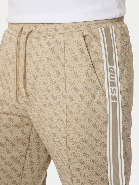 Guess Guess Spodnie dresowe Z5BB07 K2042 Beżowy Regular Fit
