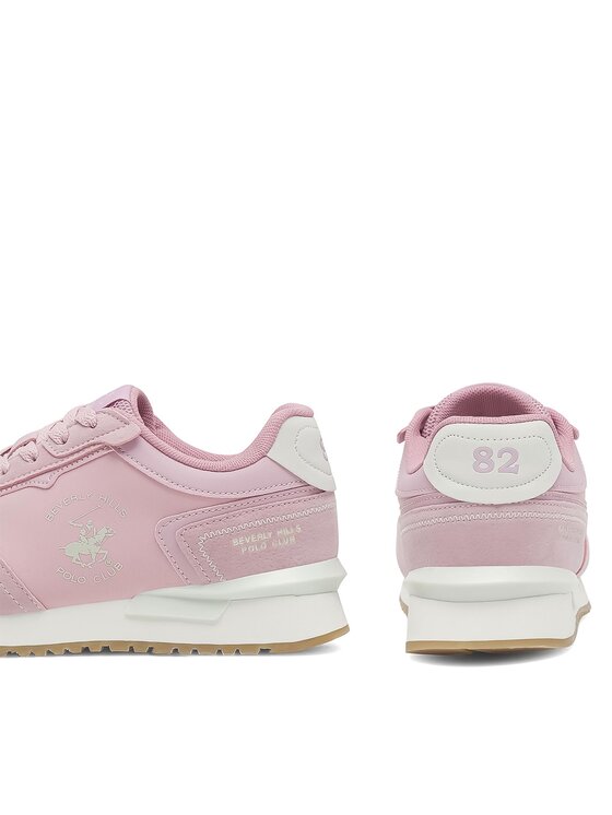 Dwa buty sportowe, jeden bokiem, drugi tyłem.