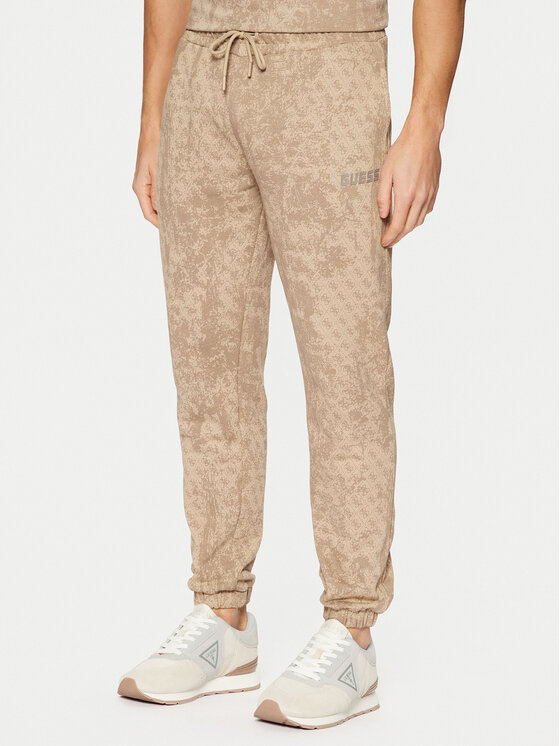Guess Pantaloni da tuta Z5RB14 K9YI1 Beige Regular Fit Modivo