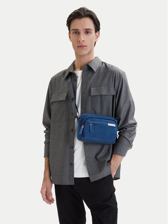 Calvin Klein Geantă crossover Sleek Denim Utility Camera Bag LV04D3432G Albastru