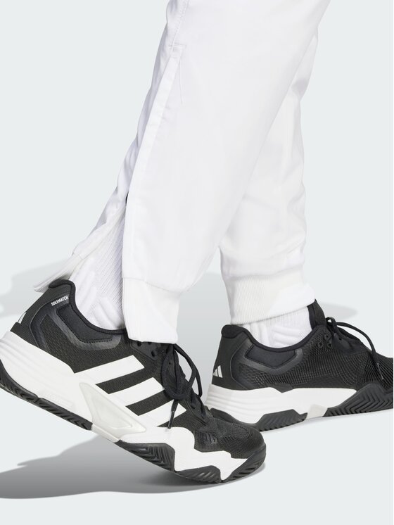 adidas adidas Spodnie materiałowe Tennis Walk-On Biały Regular Fit