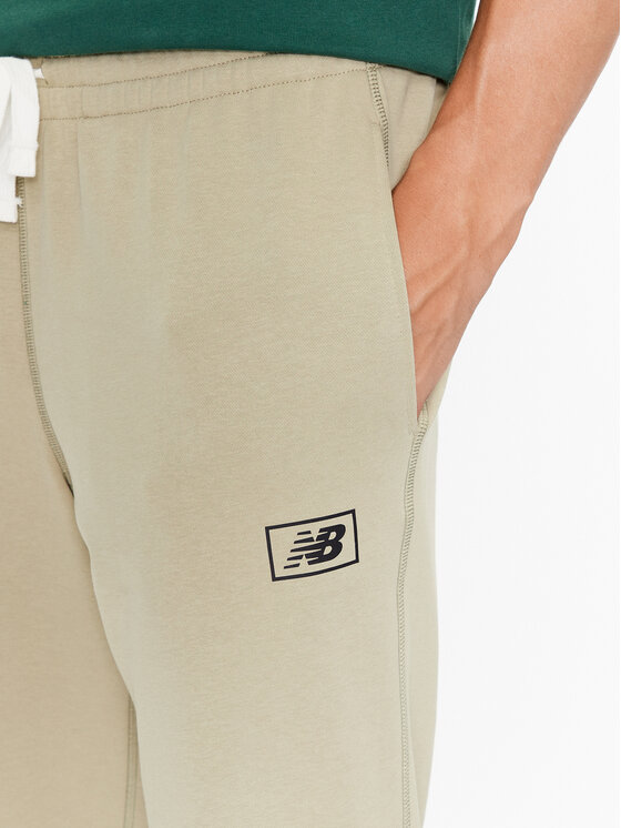 New Balance New Balance Spodnie dresowe NB Essentials Sweatpant MP33509 Zielony Regular Fit