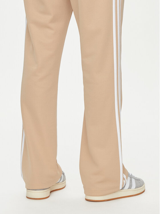 adidas adidas Spodnie dresowe adicolor 70's IX5221 Beżowy Regular Fit