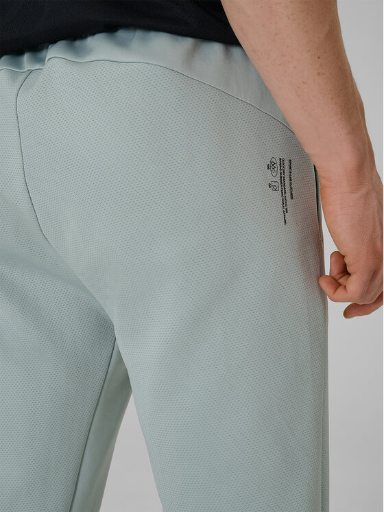 4F 4F Spodnie dresowe ATHLETIC Turkusowy Regular Fit