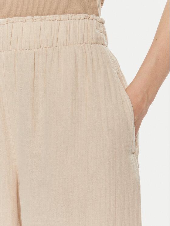 Gap Gap Riidest püksid 855967-01 Beež Relaxed Fit