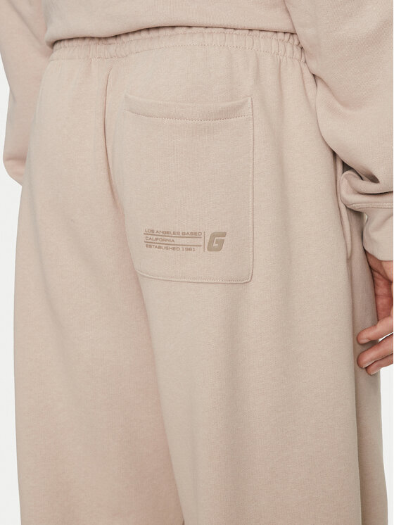 Guess Guess Donji dio trenerke Emis Z4YB00 KAIJ1 Bež Relaxed Fit