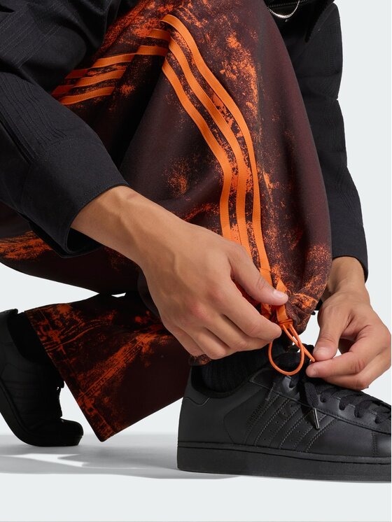 adidas adidas Spodnie dresowe 171089 Pomarańczowy Loose Fit