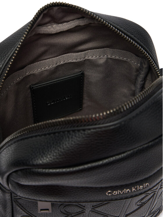 Calvin Klein Calvin Klein Brašna Emblem Aop Deboss Reporter LV04D3562G Černá