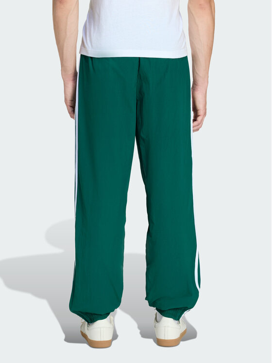 adidas adidas Spodnie dresowe FIREBIRD WOVEN Zielony Regular Fit