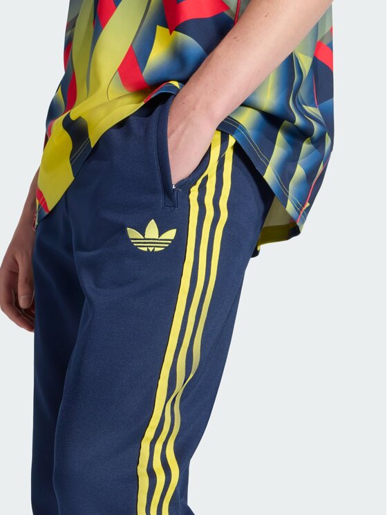 adidas adidas Spodnie dresowe Arsenal Niebieski jasny Slim Fit