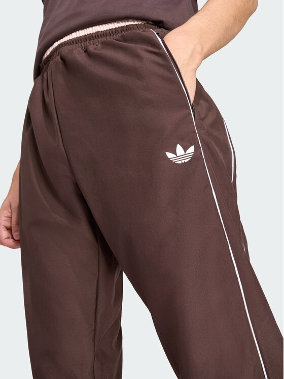 adidas adidas Spodnie dresowe HALF STRIPES Brązowy Regular Fit