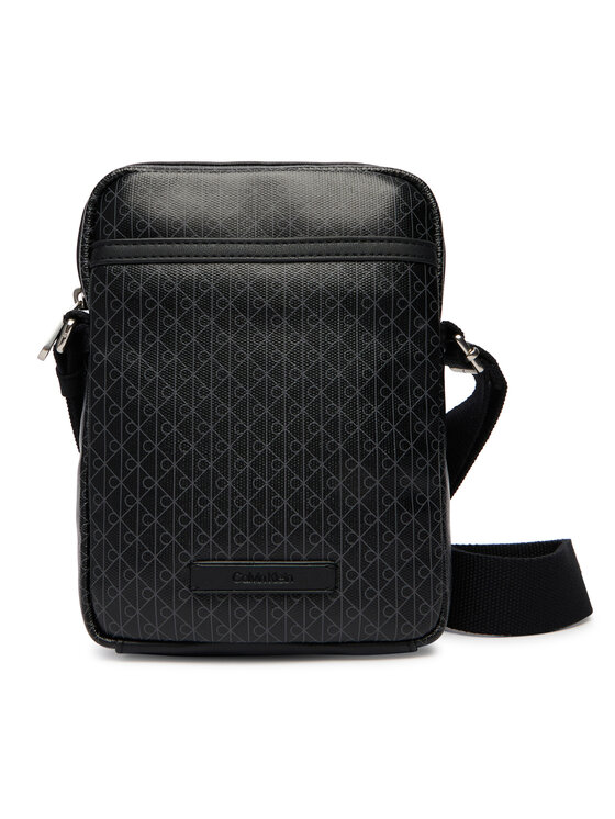 Calvin Klein Calvin Klein Brašna Emblem Aop Coated Slim Reporter LV04D3334G Černá