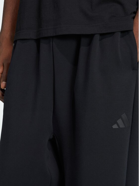 adidas adidas Spodnie materiałowe 159356 Czarny Loose Fit