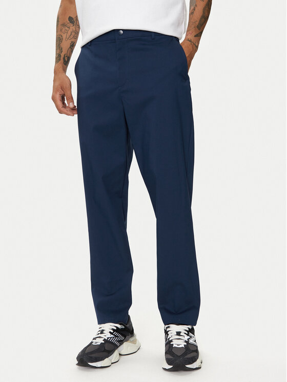 New Balance Bavlnené nohavice Athletics Standard MP43554NNY Tmavomodrá Regular Fit