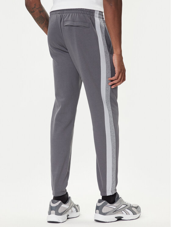 Under Armour Under Armour Spodnie dresowe Ua Rival Fleece Colorblock 6003954 Szary Loose Fit