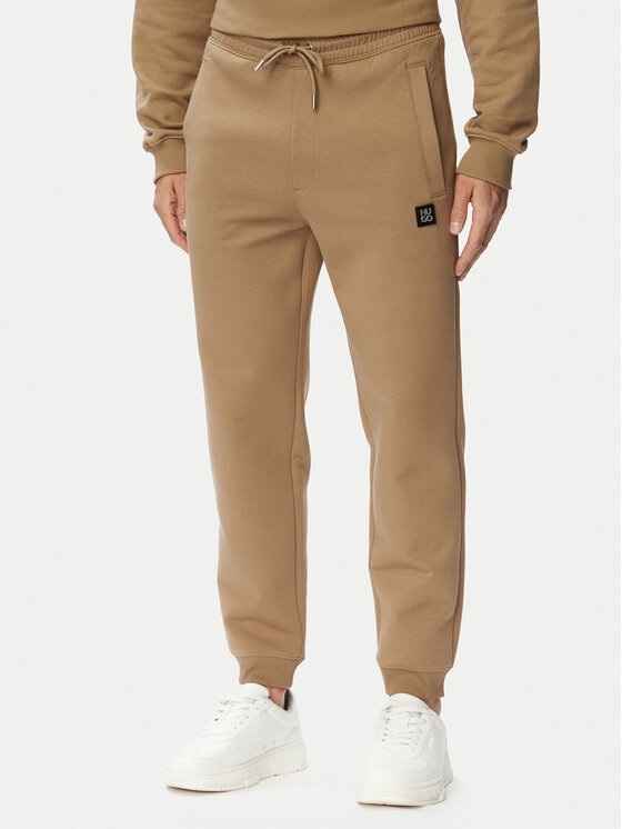 HUGO HUGO Spodnji del trenirke Dimacs 50533695 Bež Relaxed Fit