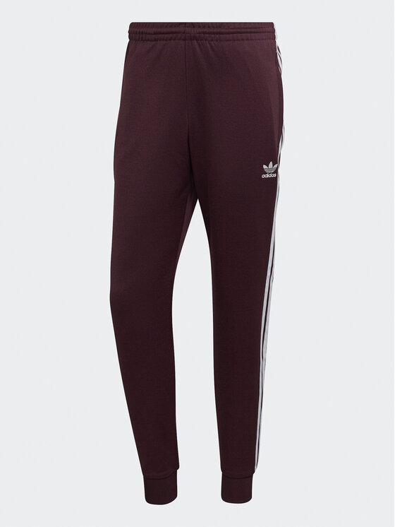adidas Pantaloni da tuta ADICOLOR CLASSICS PRIMEBLUE SST Tracksuit Bottom HK7352 Rosso Slim Fit Modivo