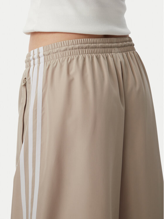 adidas adidas Dressipüksid Firebrid Adilenium Track KT0019 Beež Relaxed Fit