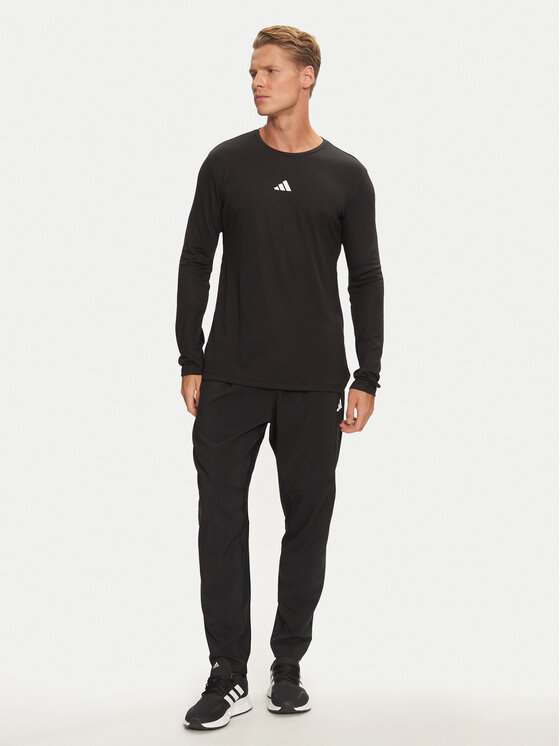 adidas adidas Donji dio trenerke Own The Run IK5024 Crna Regular Fit