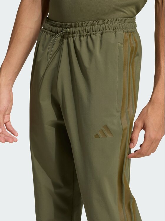 adidas adidas Spodnie materiałowe 158889 Zielony Slim Fit