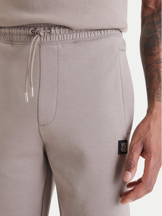 HUGO HUGO Spodnie dresowe Dimacs 50533695 Beżowy Relaxed Fit