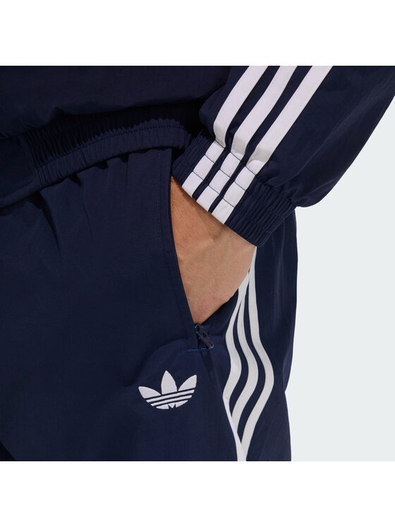 adidas adidas Spodnie dresowe FIREBIRD WOVEN Błękitny Regular Fit