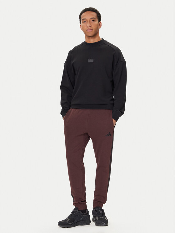 adidas adidas Παντελόνι φόρμας Essentials 3-Stripes JX0749 Καφέ Regular Fit