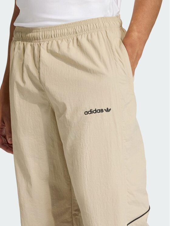 adidas adidas Spodnie dresowe Cutline Beżowy Loose Fit