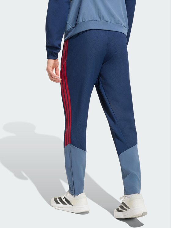 adidas adidas Spodnie materiałowe 168868 Niebieski jasny Regular Fit