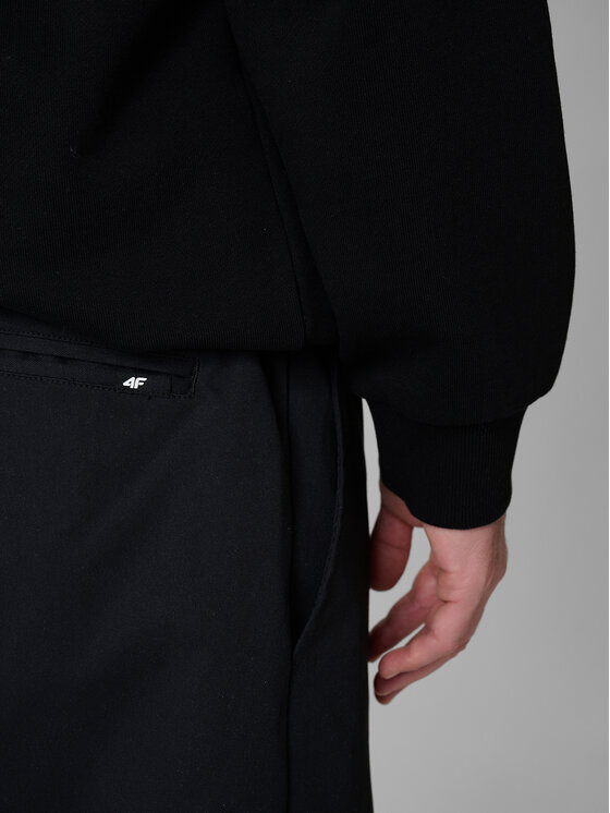 4F 4F Spodnie materiałowe SPORT STORIES 25/26 Czarny Loose Fit