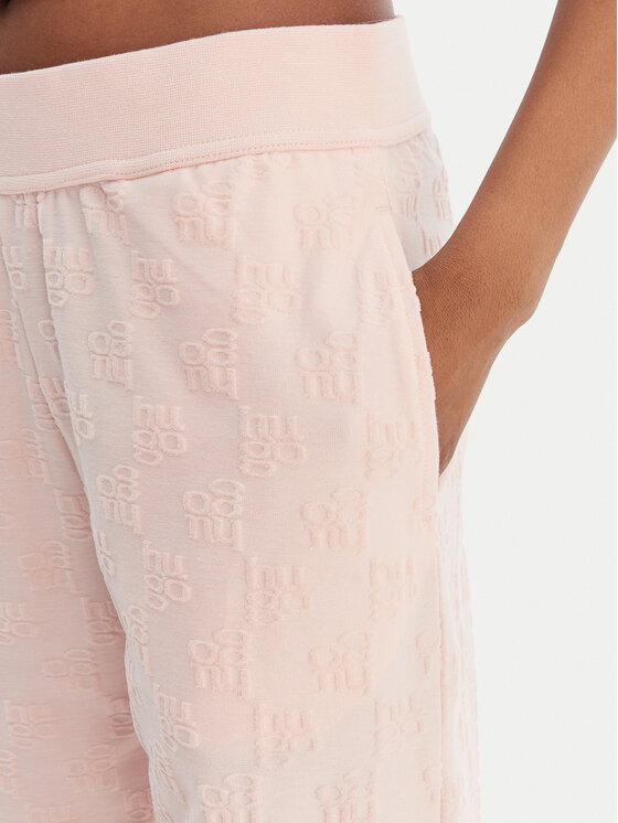 HUGO HUGO Spodnji del trenirke Monogram 50556809 Svetlo rožnata Regular Fit