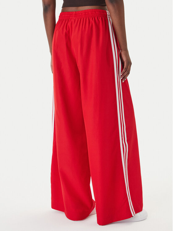 adidas adidas Teplákové nohavice Firebird Adilenium KD6299 Červená Regular Fit