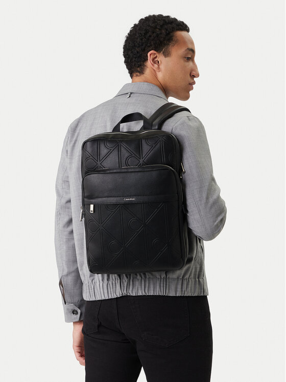 Calvin Klein Geantă crossover Emblem Aop Emboss Slim Square Bp LV04D3328G Negru