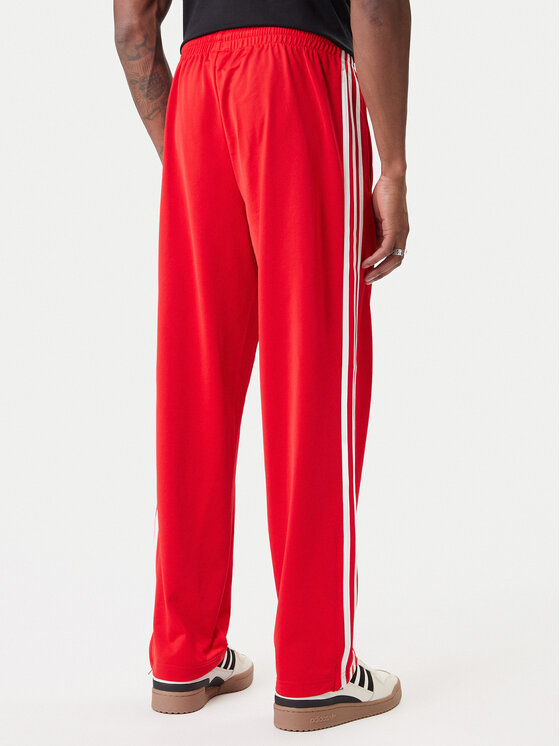 adidas adidas Teplákové kalhoty Firebird KD8319 Červená Loose Fit