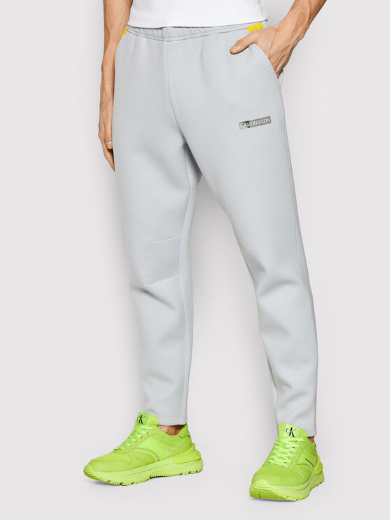 Calvin Klein Performance Pantaloni da tuta 00GMH1P609 Grigio Slim Fit •  Modivo.it