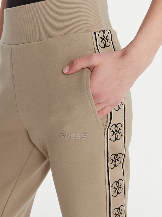 Guess Guess Spodnie dresowe V2YB15 KB3P2 Beżowy Regular Fit