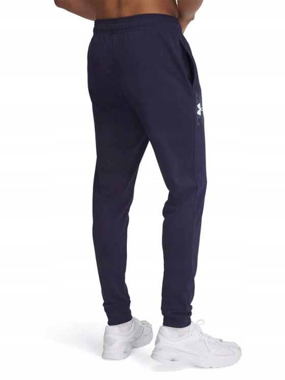 Under Armour Under Armour Spodnie dresowe 1390144-410 Granatowy Standard Fit
