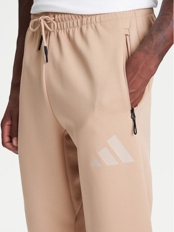 adidas adidas Παντελόνι φόρμας Z.N.E. JW4725 Μπεζ Loose Fit