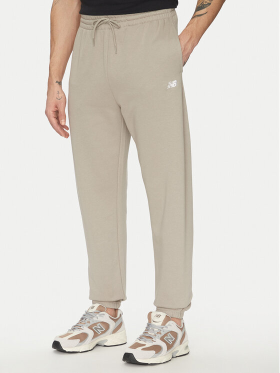 New Balance New Balance Pantaloni trening Essentials MP41519 Bej Relaxed Fit