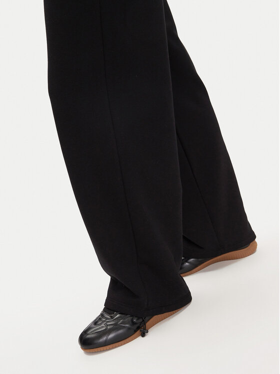 Karl Kani Karl Kani Pantaloni trening Signature Os 61030062 Negru Relaxed Fit