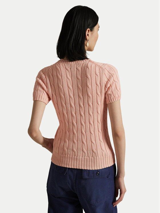 Modelka nosząca sweter z krótkim rękawem, widok pleców.