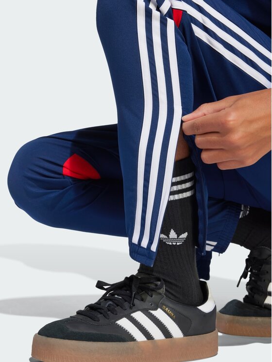 adidas adidas Spodnie materiałowe Tiro Niebieski jasny Regular Fit