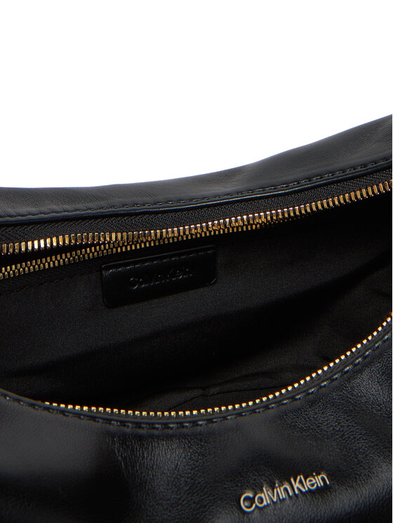 Calvin Klein Calvin Klein Käekott Pinched Soft Crescent Sm LV04F3010G Must