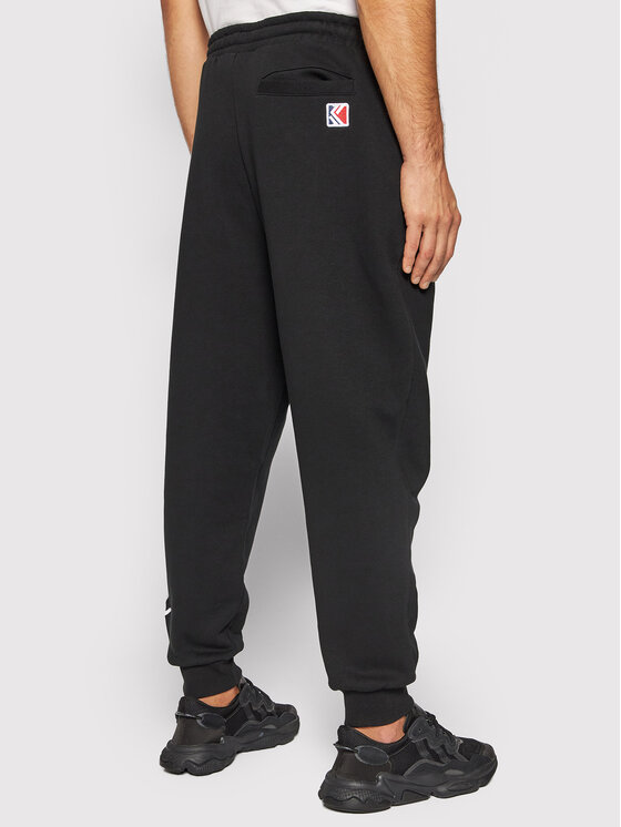 Karl Kani Karl Kani Spodnji del trenirke Signature Retro 6004737 Črna Relaxed Fit