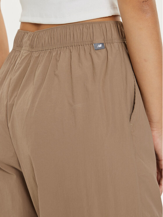 New Balance New Balance Donji dio trenerke WP43534 Bež Relaxed Fit