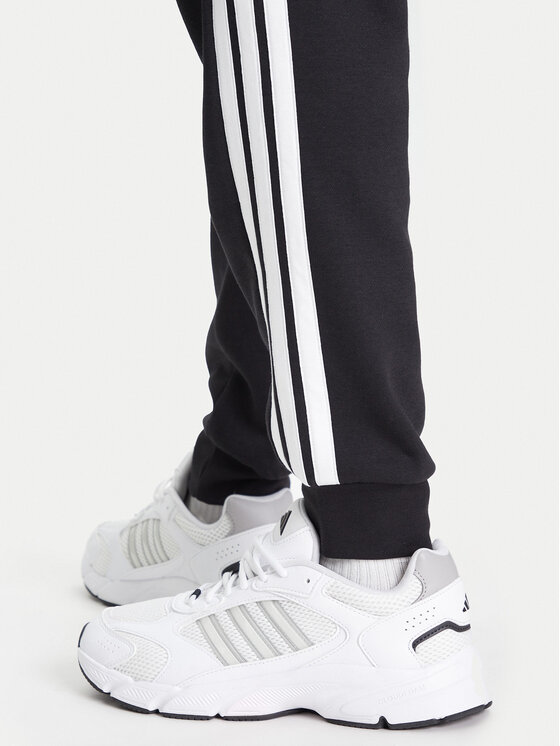 adidas adidas Долнище анцуг Essentials 3-Stripes JD1861 Черен Regular Fit