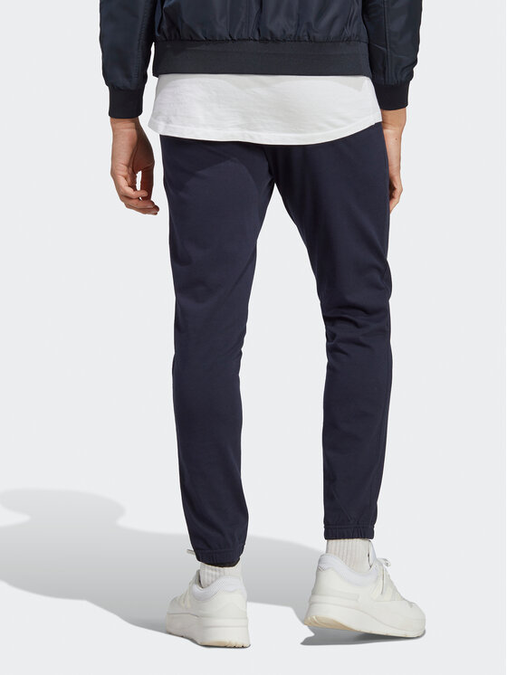 adidas adidas Dressipüksid Essentials IC0056 Tumesinine Regular Fit