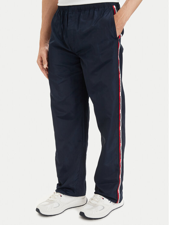 Tommy Jeans Pantaloni trening DM0DM23123 Bleumarin Relaxed Fit