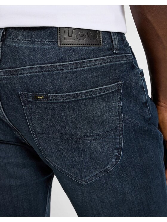 Lee Lee Jeansy Straight Fit XM - Extreme Motion - Tapered Leg Niebieski Tapered Fit